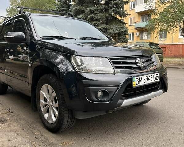 Черный Сузуки Гранд Витара, объемом двигателя 2.39 л и пробегом 77 тыс. км за 9800 $, фото 1 на Automoto.ua