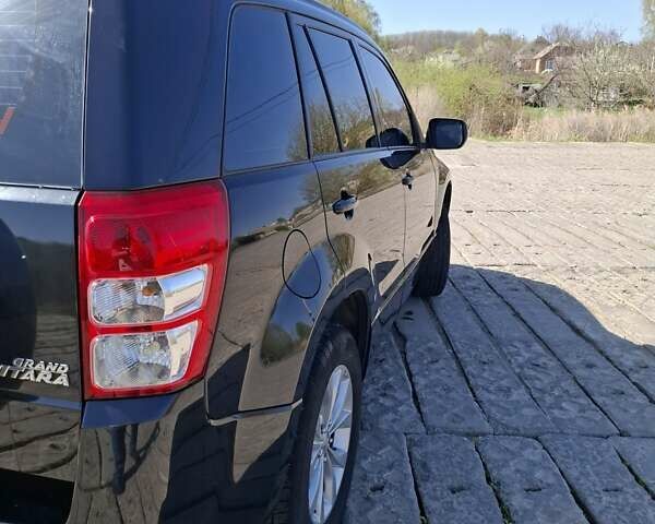 Чорний Сузукі Гранд Вітара, об'ємом двигуна 2.39 л та пробігом 142 тис. км за 13000 $, фото 10 на Automoto.ua