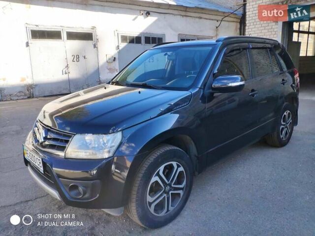 Черный Сузуки Гранд Витара, объемом двигателя 2.39 л и пробегом 181 тыс. км за 12000 $, фото 1 на Automoto.ua