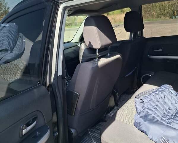 Чорний Сузукі Гранд Вітара, об'ємом двигуна 2.39 л та пробігом 142 тис. км за 13000 $, фото 1 на Automoto.ua