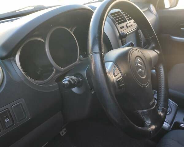 Черный Сузуки Гранд Витара, объемом двигателя 2.39 л и пробегом 181 тыс. км за 12000 $, фото 6 на Automoto.ua