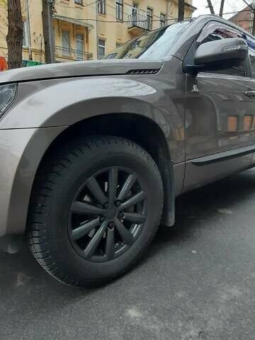 Коричневый Сузуки Гранд Витара, объемом двигателя 2.39 л и пробегом 92 тыс. км за 12700 $, фото 1 на Automoto.ua