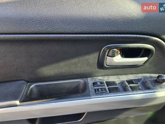 Коричневий Сузукі Гранд Вітара, об'ємом двигуна 2.39 л та пробігом 163 тис. км за 13000 $, фото 13 на Automoto.ua
