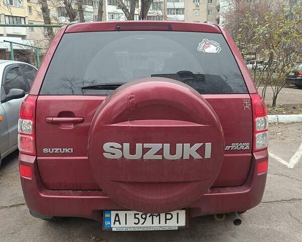 Красный Сузуки Гранд Витара, объемом двигателя 2 л и пробегом 185 тыс. км за 7000 $, фото 2 на Automoto.ua