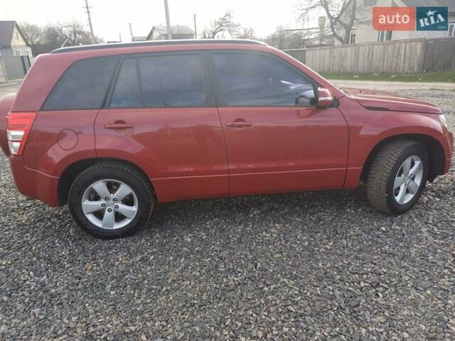 Красный Сузуки Гранд Витара, объемом двигателя 2.39 л и пробегом 100 тыс. км за 10500 $, фото 7 на Automoto.ua