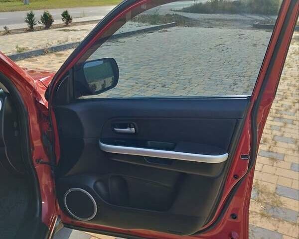 Червоний Сузукі Гранд Вітара, об'ємом двигуна 2.4 л та пробігом 172 тис. км за 8450 $, фото 13 на Automoto.ua