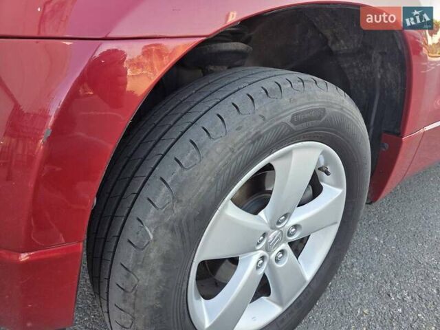 Червоний Сузукі Гранд Вітара, об'ємом двигуна 2.4 л та пробігом 161 тис. км за 10000 $, фото 13 на Automoto.ua