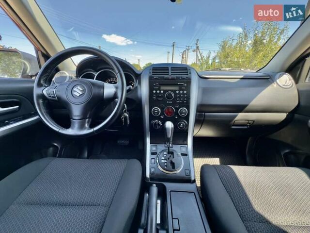 Красный Сузуки Гранд Витара, объемом двигателя 2.39 л и пробегом 35 тыс. км за 13900 $, фото 8 на Automoto.ua
