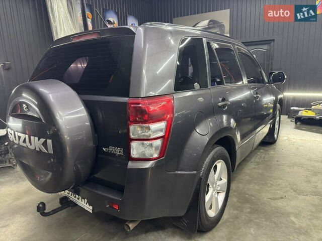Серый Сузуки Гранд Витара, объемом двигателя 2.4 л и пробегом 136 тыс. км за 9300 $, фото 2 на Automoto.ua
