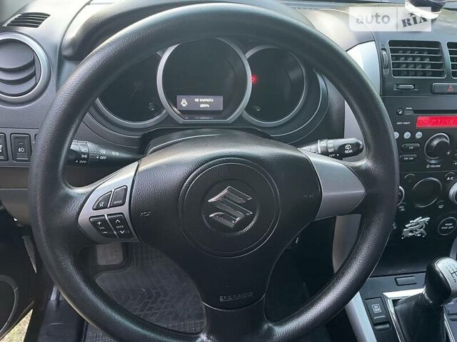 Серый Сузуки Гранд Витара, объемом двигателя 2.4 л и пробегом 136 тыс. км за 9300 $, фото 18 на Automoto.ua