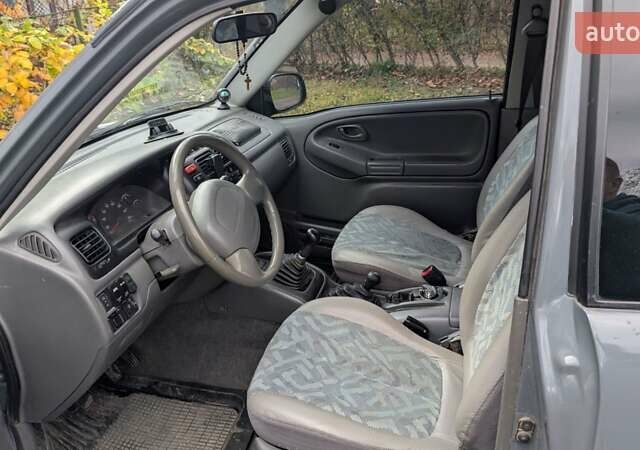 Сірий Сузукі Гранд Вітара, об'ємом двигуна 1.6 л та пробігом 240 тис. км за 8888 $, фото 3 на Automoto.ua