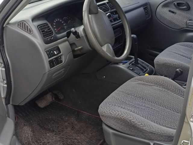 Серый Сузуки Гранд Витара, объемом двигателя 2.5 л и пробегом 250 тыс. км за 5000 $, фото 4 на Automoto.ua