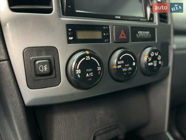 Серый Сузуки Гранд Витара, объемом двигателя 2 л и пробегом 325 тыс. км за 5099 $, фото 17 на Automoto.ua