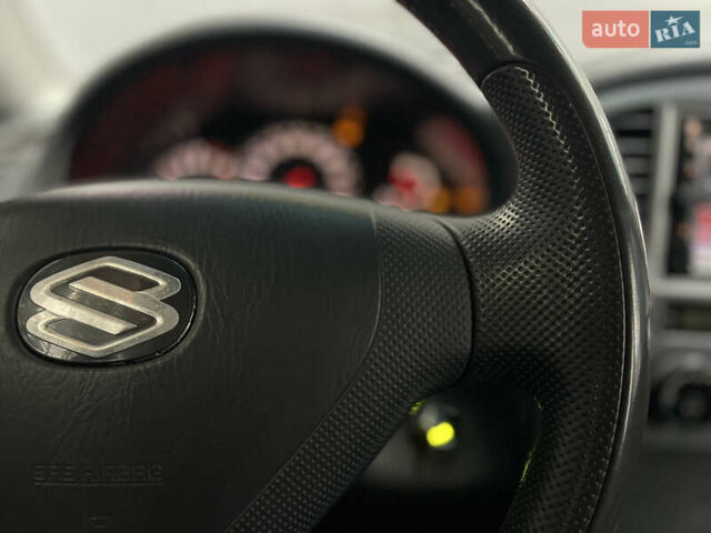 Серый Сузуки Гранд Витара, объемом двигателя 2 л и пробегом 325 тыс. км за 5099 $, фото 11 на Automoto.ua