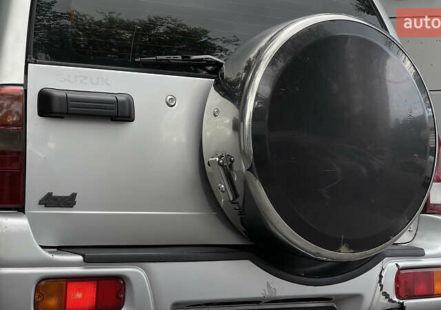 Серый Сузуки Гранд Витара, объемом двигателя 2 л и пробегом 325 тыс. км за 5099 $, фото 4 на Automoto.ua