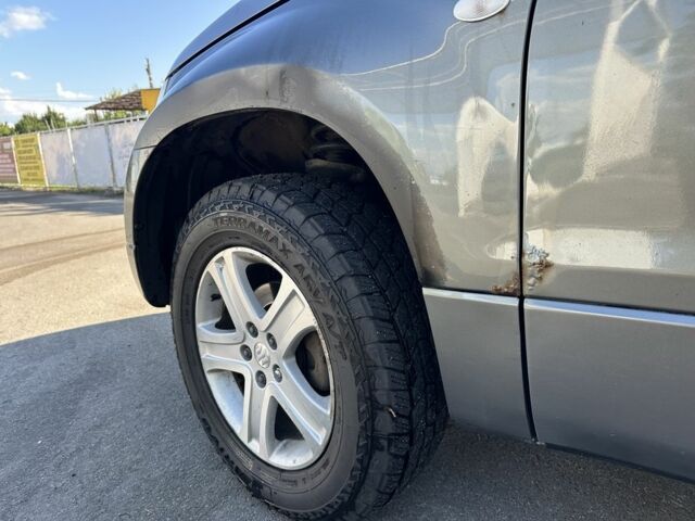 Серый Сузуки Гранд Витара, объемом двигателя 1.9 л и пробегом 360 тыс. км за 4500 $, фото 11 на Automoto.ua