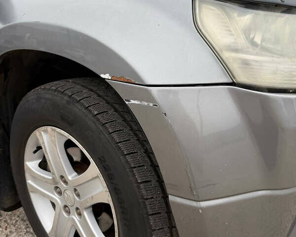 Серый Сузуки Гранд Витара, объемом двигателя 2 л и пробегом 241 тыс. км за 6200 $, фото 11 на Automoto.ua