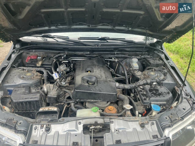 Серый Сузуки Гранд Витара, объемом двигателя 2 л и пробегом 218 тыс. км за 6000 $, фото 7 на Automoto.ua