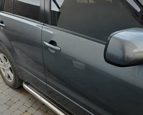 Серый Сузуки Гранд Витара, объемом двигателя 2 л и пробегом 160 тыс. км за 7700 $, фото 2 на Automoto.ua