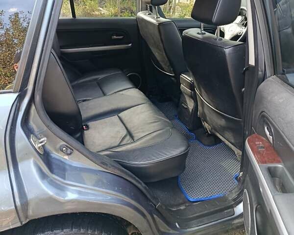 Сірий Сузукі Гранд Вітара, об'ємом двигуна 2 л та пробігом 339 тис. км за 6900 $, фото 1 на Automoto.ua