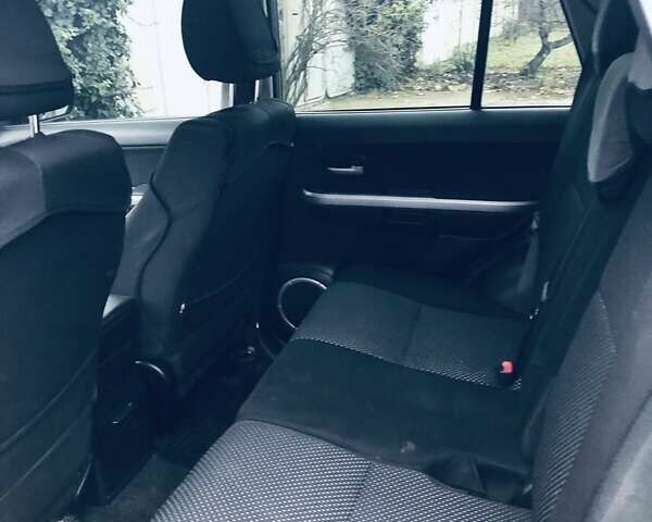 Сірий Сузукі Гранд Вітара, об'ємом двигуна 2 л та пробігом 115 тис. км за 7689 $, фото 8 на Automoto.ua