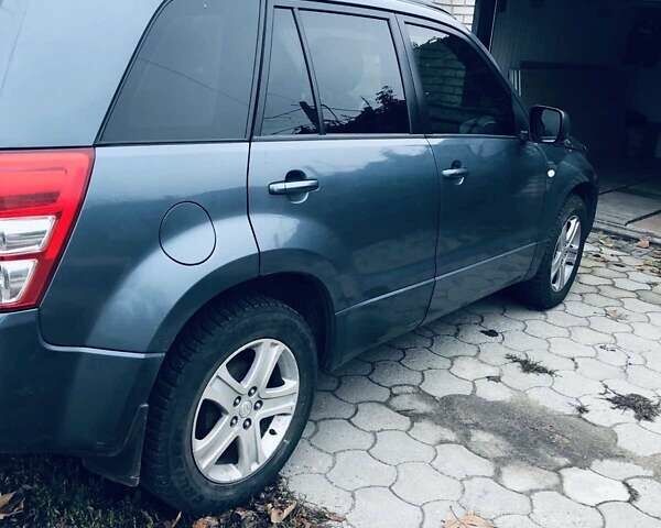 Сірий Сузукі Гранд Вітара, об'ємом двигуна 2 л та пробігом 115 тис. км за 7689 $, фото 10 на Automoto.ua