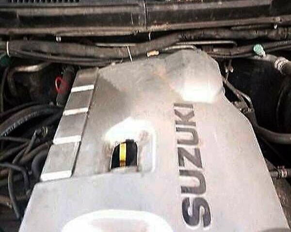 Сірий Сузукі Гранд Вітара, об'ємом двигуна 2 л та пробігом 250 тис. км за 7499 $, фото 9 на Automoto.ua