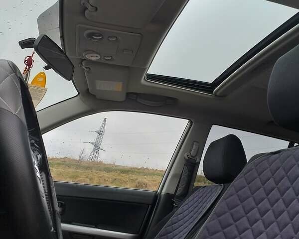 Сірий Сузукі Гранд Вітара, об'ємом двигуна 1.87 л та пробігом 228 тис. км за 8000 $, фото 13 на Automoto.ua