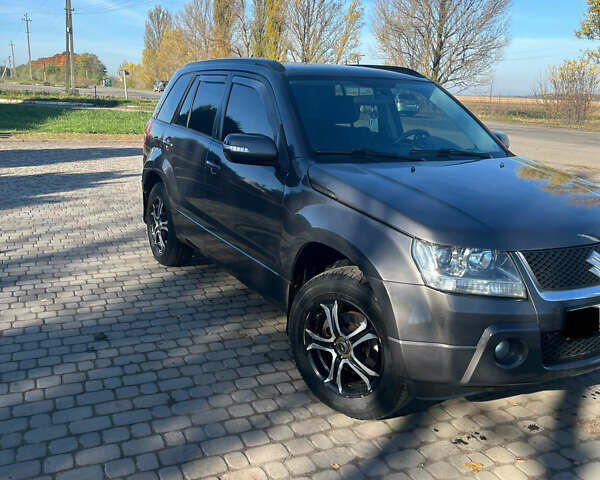 Серый Сузуки Гранд Витара, объемом двигателя 2.4 л и пробегом 283 тыс. км за 6777 $, фото 3 на Automoto.ua