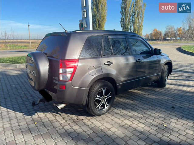 Серый Сузуки Гранд Витара, объемом двигателя 2.4 л и пробегом 283 тыс. км за 6777 $, фото 1 на Automoto.ua