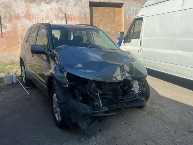 Серый Сузуки Гранд Витара, объемом двигателя 2 л и пробегом 150 тыс. км за 1900 $, фото 1 на Automoto.ua