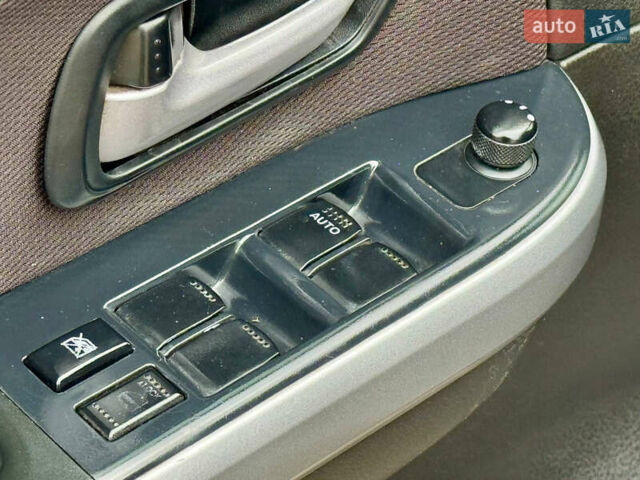 Сузуки Гранд Витара 2010 в Харькове на Automoto.ua Серый Сузуки Гранд Витара, объемом двигателя 2.4 л и пробегом 200 тыс. км за 8750 $, фото 9 на Automoto.ua