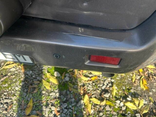 Серый Сузуки Гранд Витара, объемом двигателя 2.4 л и пробегом 117 тыс. км за 10000 $, фото 4 на Automoto.ua