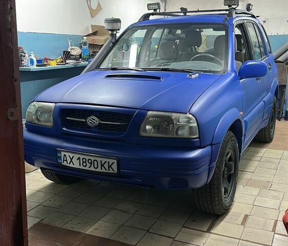 Синій Сузукі Гранд Вітара, об'ємом двигуна 2 л та пробігом 300 тис. км за 4000 $, фото 1 на Automoto.ua