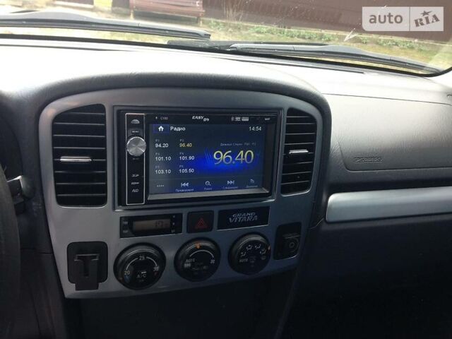 Синий Сузуки Гранд Витара, объемом двигателя 2 л и пробегом 190 тыс. км за 8000 $, фото 12 на Automoto.ua