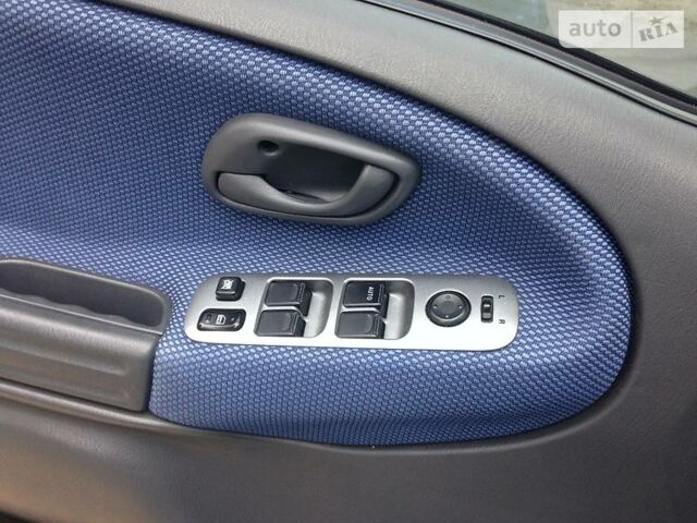 Синий Сузуки Гранд Витара, объемом двигателя 2 л и пробегом 190 тыс. км за 8000 $, фото 14 на Automoto.ua
