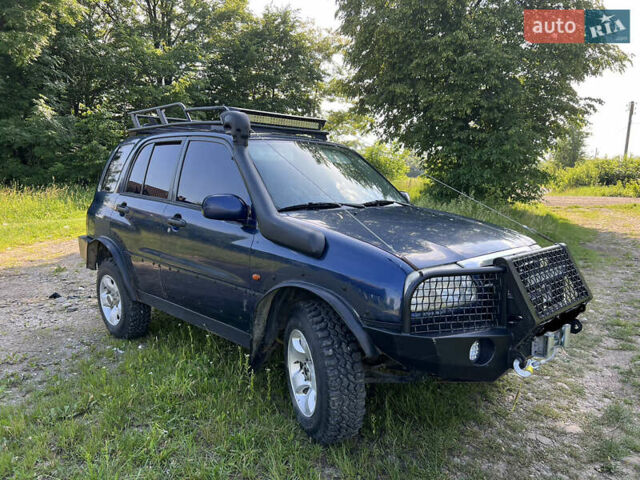 Синій Сузукі Гранд Вітара, об'ємом двигуна 2 л та пробігом 313 тис. км за 9400 $, фото 1 на Automoto.ua