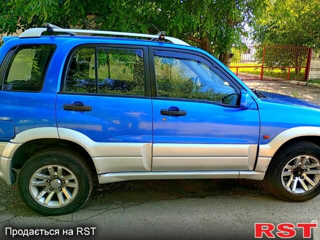 Синий Сузуки Гранд Витара, объемом двигателя 2 л и пробегом 358 тыс. км за 5500 $, фото 1 на Automoto.ua