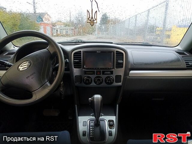 Синій Сузукі Гранд Вітара, об'ємом двигуна 2 л та пробігом 188 тис. км за 5400 $, фото 4 на Automoto.ua