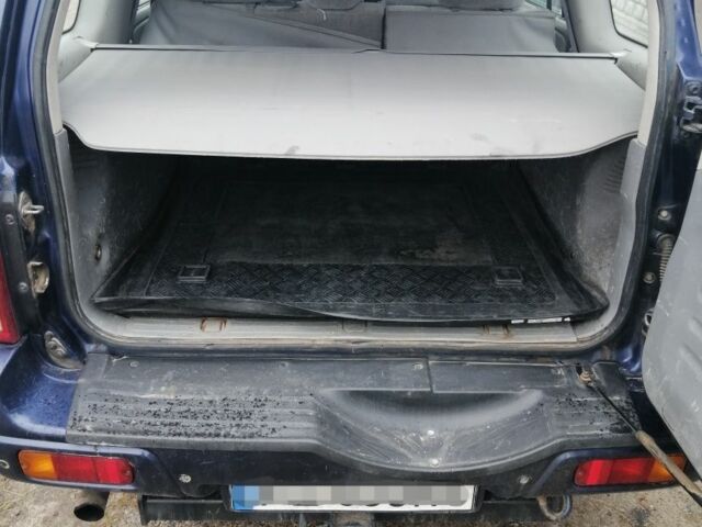 Синий Сузуки Гранд Витара, объемом двигателя 2 л и пробегом 357 тыс. км за 3750 $, фото 12 на Automoto.ua