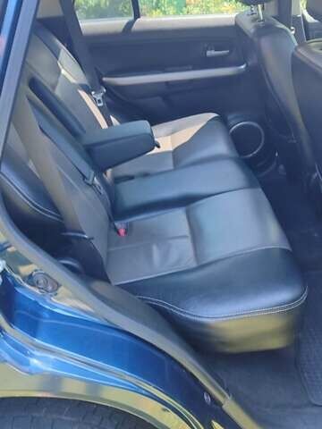 Синій Сузукі Гранд Вітара, об'ємом двигуна 2.4 л та пробігом 200 тис. км за 8355 $, фото 1 на Automoto.ua