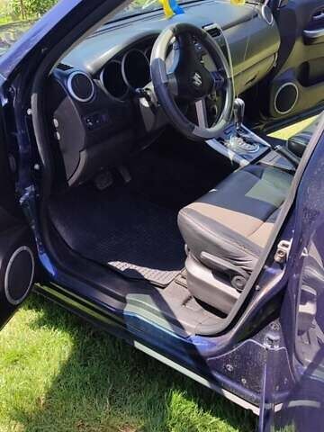 Синій Сузукі Гранд Вітара, об'ємом двигуна 2.4 л та пробігом 200 тис. км за 8355 $, фото 3 на Automoto.ua