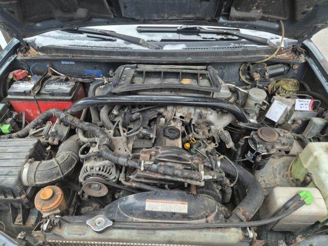 Зеленый Сузуки Гранд Витара, объемом двигателя 2 л и пробегом 250 тыс. км за 1082 $, фото 5 на Automoto.ua