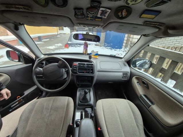 Зеленый Сузуки Гранд Витара, объемом двигателя 2 л и пробегом 250 тыс. км за 1082 $, фото 6 на Automoto.ua