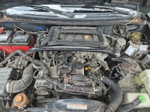 Зеленый Сузуки Гранд Витара, объемом двигателя 2 л и пробегом 250 тыс. км за 1082 $, фото 3 на Automoto.ua