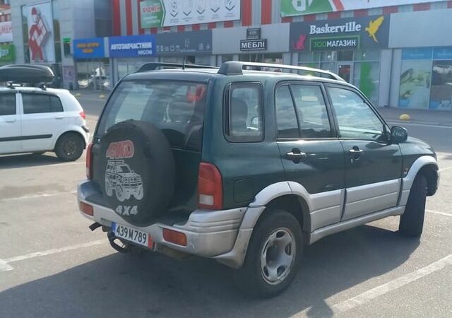 Зелений Сузукі Гранд Вітара, об'ємом двигуна 2 л та пробігом 290 тис. км за 2900 $, фото 2 на Automoto.ua