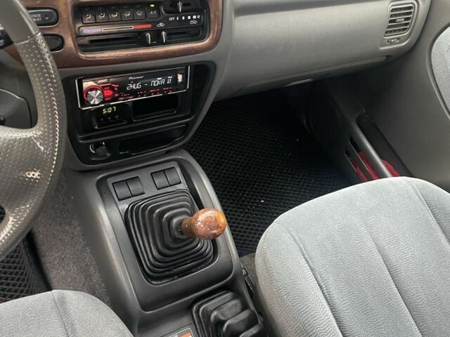 Зелений Сузукі Гранд Вітара, об'ємом двигуна 2.7 л та пробігом 184 тис. км за 3600 $, фото 13 на Automoto.ua