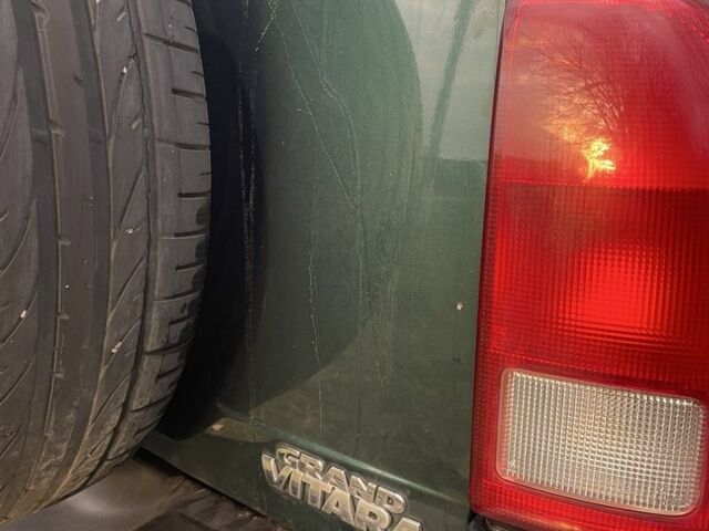 Зелений Сузукі Гранд Вітара, об'ємом двигуна 2.7 л та пробігом 184 тис. км за 3600 $, фото 18 на Automoto.ua