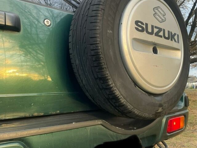 Зелений Сузукі Гранд Вітара, об'ємом двигуна 2.7 л та пробігом 184 тис. км за 3600 $, фото 5 на Automoto.ua
