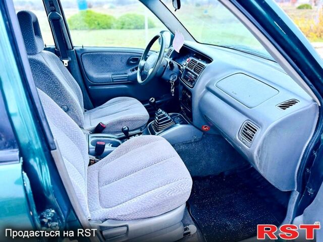 Зеленый Сузуки Гранд Витара, объемом двигателя 2 л и пробегом 340 тыс. км за 2350 $, фото 5 на Automoto.ua